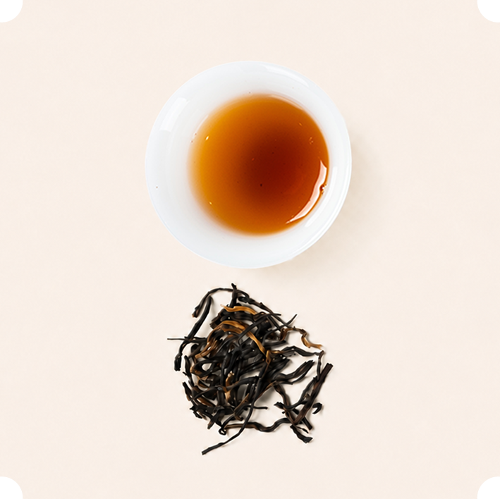 Wuyishan Rock Tea tea liquor and dry leaves